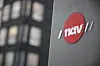 Navs logo på en husvegg.